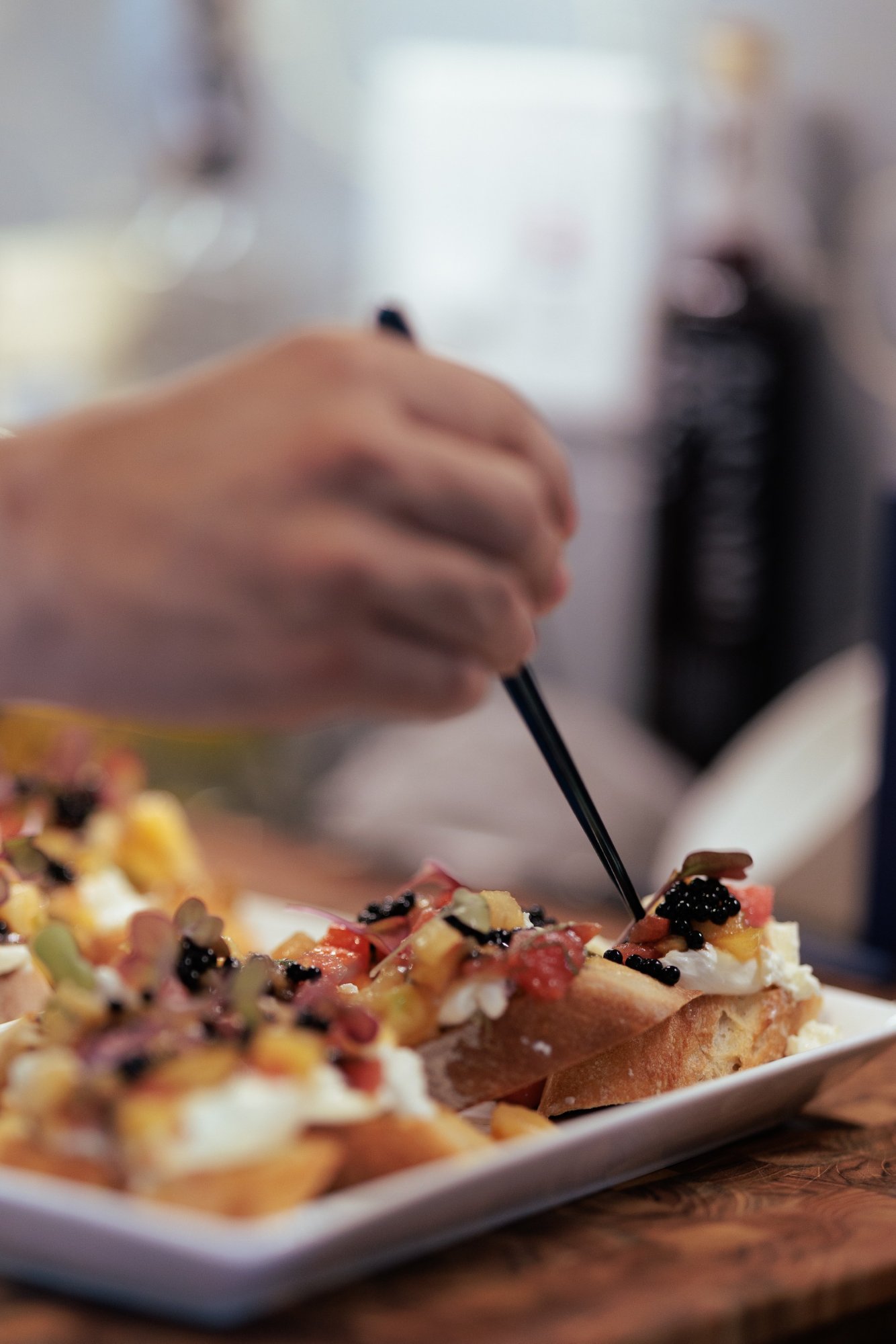 Bruschetta with caviar and fresh toppings